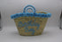 Handwoven Seagrass Basket with Blue Pom Poms and Handles