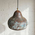 Enhance your living space with an Art of handmade copper pear light