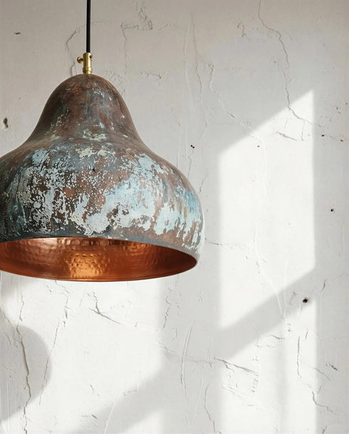 Enhance your living space with an Art of handmade copper pear light