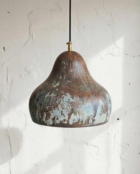 Enhance your living space with an Art of handmade copper pear light