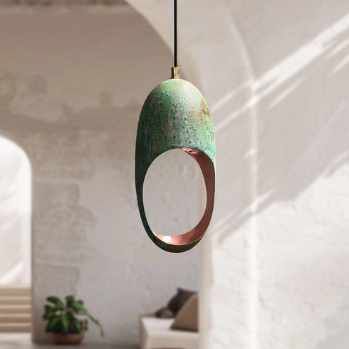 Bring a unique artistic statement with an Art of handmade single verdigris pendant