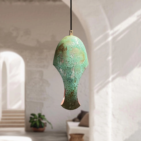 Bring a unique artistic statement with an Art of handmade single verdigris pendant