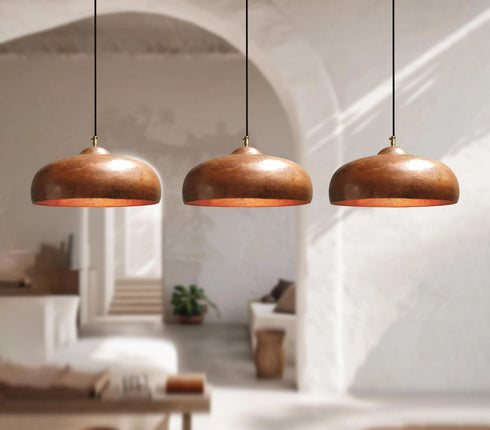 Transform your space with a stunning Art of handmade aged copper pendant trio.
