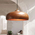 Transform your space with a stunning Art of handmade aged copper pendant trio.