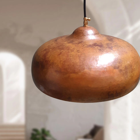 Transform your space with a stunning Art of handmade aged copper pendant trio.