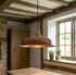 Bring timeless elegance to your home with an Art of handmade flared copper pendant.