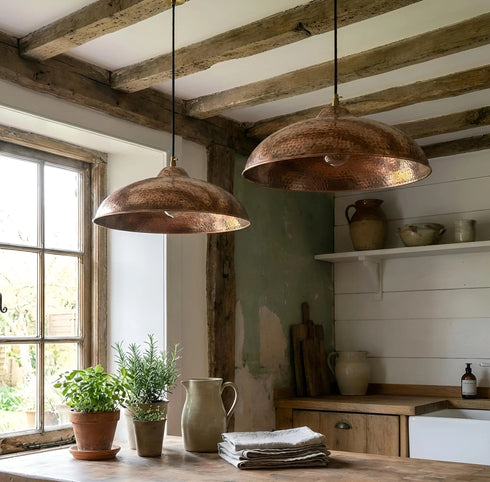 Bring timeless elegance to your home with an Art of handmade flared copper pendant.