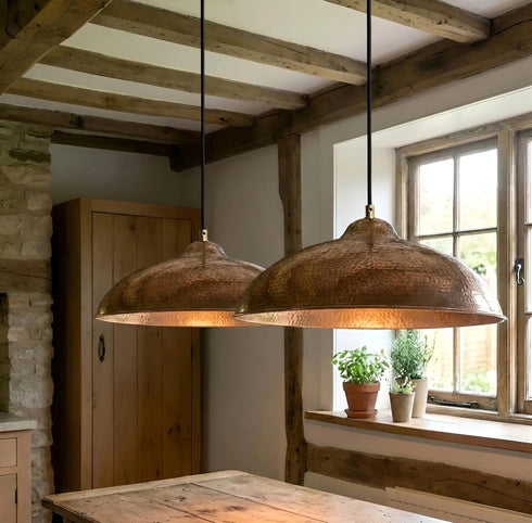 Bring timeless elegance to your home with an Art of handmade flared copper pendant.