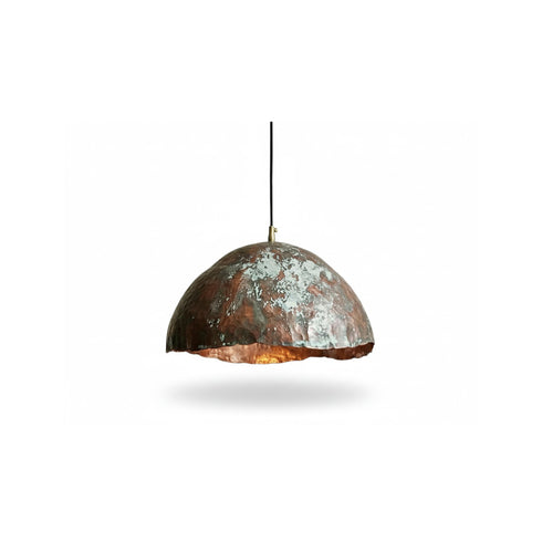 Add a bold artistic touch with an Art of handmade wavy copper pendant