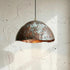 Add a bold artistic touch with an Art of handmade wavy copper pendant
