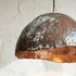 Add a bold artistic touch with an Art of handmade wavy copper pendant