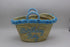 Handwoven Seagrass Basket with Blue Pom Poms and Handles