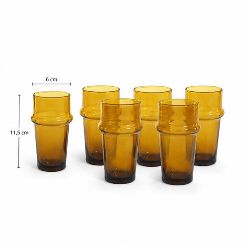 Warm up your drinkware collection with an Art of handmade amber Moroccan tea glass.