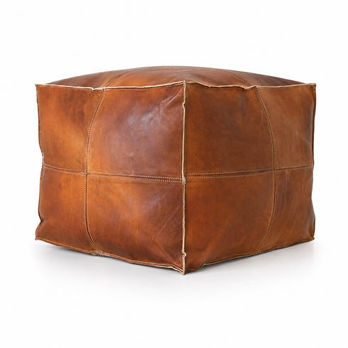 Anchor your room with a sleek, handmade Moroccan square leather pouf.