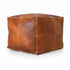Anchor your room with a sleek, handmade Moroccan square leather pouf.