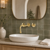 Wall-Mount Bathroom Sink Faucet with 8-Inch Spout – Unlacquered Brass