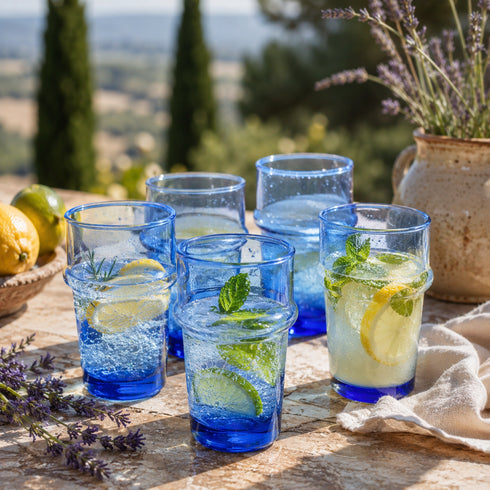 Dress a vibrant tablescape with our Art of handmade blue Moroccan Beldi glasses.