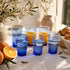 Dress a vibrant tablescape with our Art of handmade blue Moroccan Beldi glasses.
