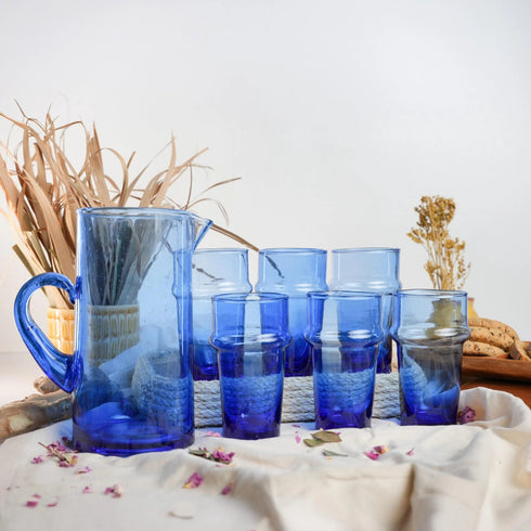 Dress a vibrant tablescape with our Art of handmade blue Moroccan Beldi glasses.