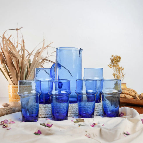 Dress a vibrant tablescape with our Art of handmade blue Moroccan Beldi glasses.