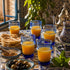 Dress a vibrant tablescape with our Art of handmade blue Moroccan Beldi glasses.
