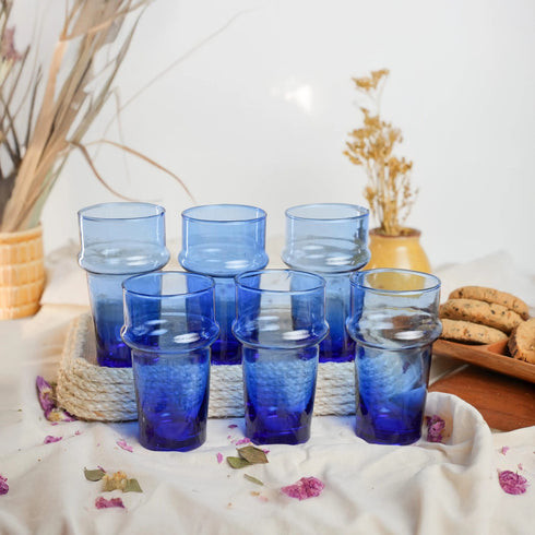 Dress a vibrant tablescape with our Art of handmade blue Moroccan Beldi glasses.