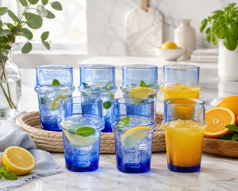 Dress a vibrant tablescape with our Art of handmade blue Moroccan Beldi glasses.