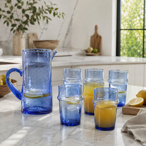 Dress a vibrant tablescape with our Art of handmade blue Moroccan Beldi glasses.