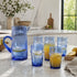 Dress a vibrant tablescape with our Art of handmade blue Moroccan Beldi glasses.