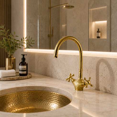 Complete your custom vanity with an Art of handmade brass arched faucet.