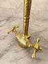 Complete your custom vanity with an Art of handmade brass arched faucet.