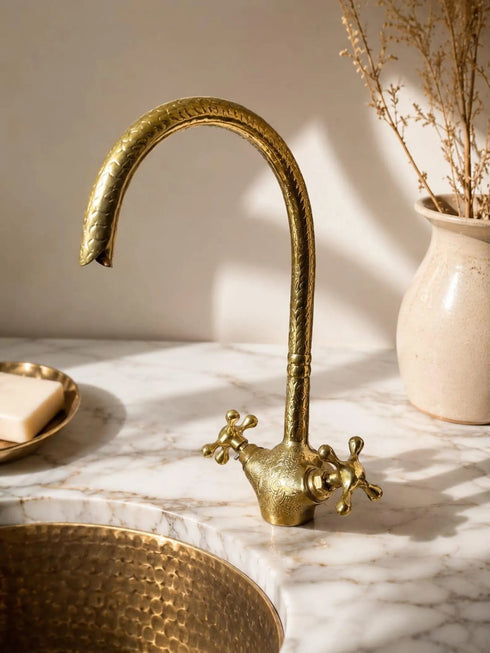 Complete your custom vanity with an Art of handmade brass arched faucet.
