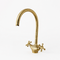 Complete your custom vanity with an Art of handmade brass arched faucet.