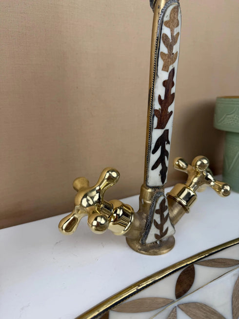 Anchor your luxury bathroom vanity with our Art of handmade brass pattern sink.