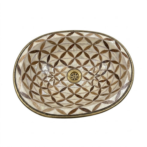 Anchor your luxury bathroom vanity with our Art of handmade brass pattern sink.