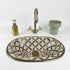 Anchor your luxury bathroom vanity with our Art of handmade brass pattern sink.