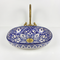 Grace your vanity counter with an Art of handmade ceramic oval floral sink.