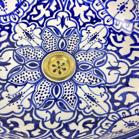 Grace your vanity counter with an Art of handmade ceramic oval floral sink.