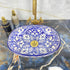 Grace your vanity counter with an Art of handmade ceramic oval floral sink.