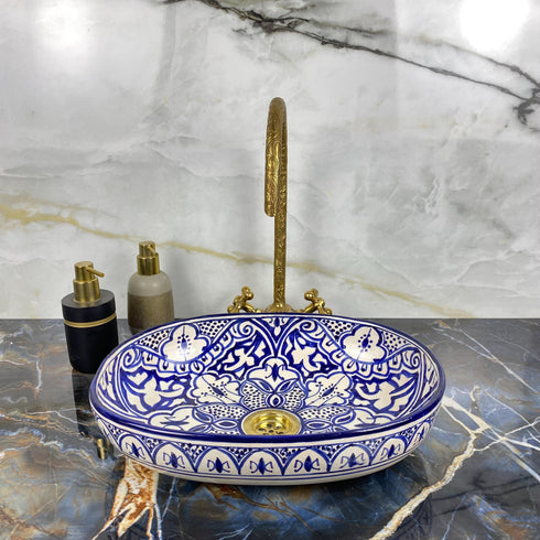 Grace your vanity counter with an Art of handmade ceramic oval floral sink.