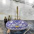 Grace your vanity counter with an Art of handmade ceramic oval floral sink.