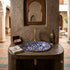 Grace your vanity counter with an Art of handmade ceramic oval floral sink.