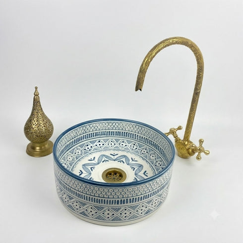 Illuminate your vanity with an Art of handmade ceramic round sink.
