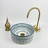 Illuminate your vanity with an Art of handmade ceramic round sink.