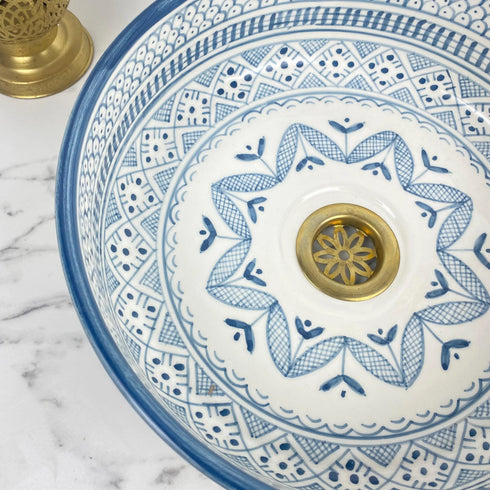 Illuminate your vanity with an Art of handmade ceramic round sink.