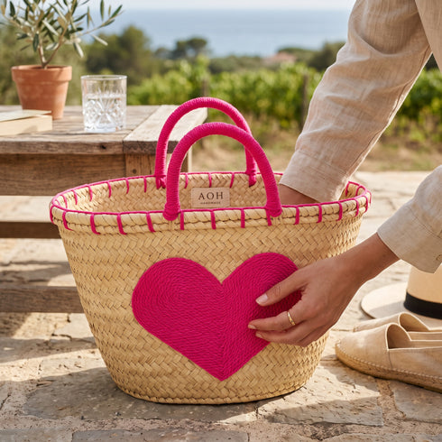 Handwoven Moroccan Palm Leaf Basket with Pink Heart