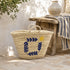 Handwoven Moroccan Palm Leaf Basket with Blue Leaf & Sun Embroidery