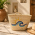 Handwoven Moroccan Palm Leaf Basket with Sun & Wave Embroidery