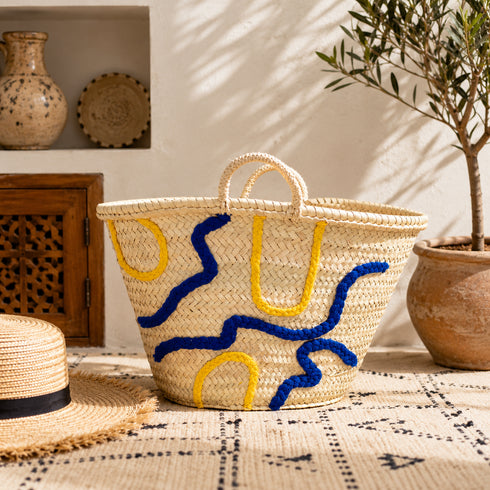 Handwoven Moroccan Palm Leaf Basket with Blue & Yellow Abstract Embroidery