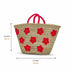 Large handwoven Moroccan straw basket with embroidered flowers